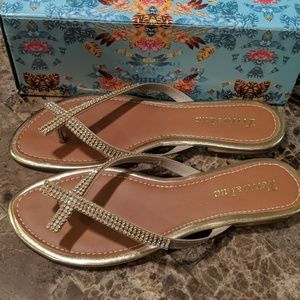 Gold and silver rinestone flip flops size 9